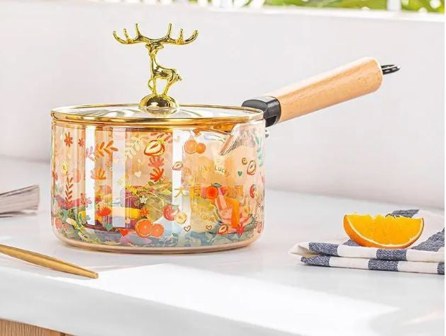 Pyrex casserole with wooden handle and lid with gazelle handle
