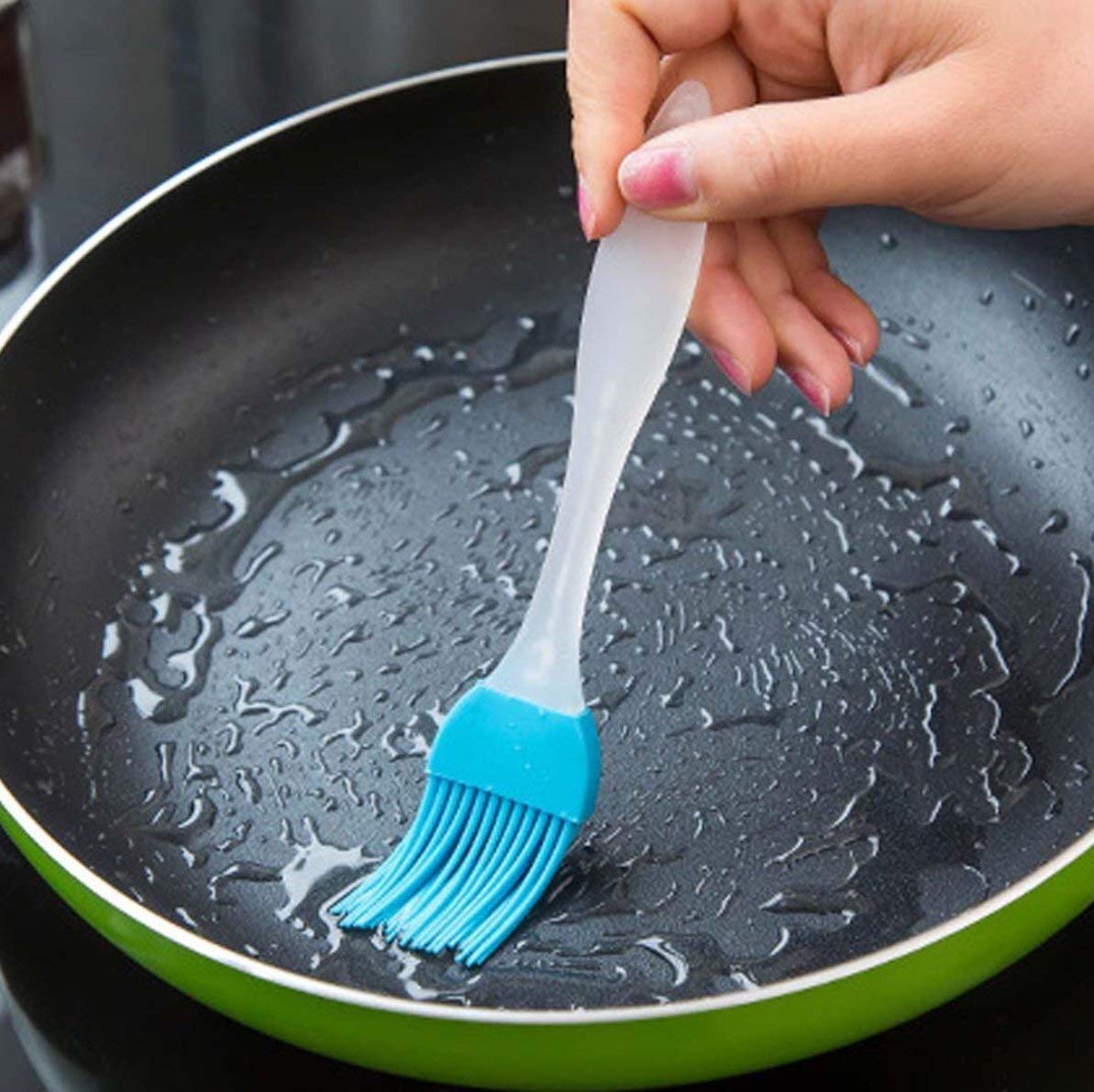 Spoon and silicone brush