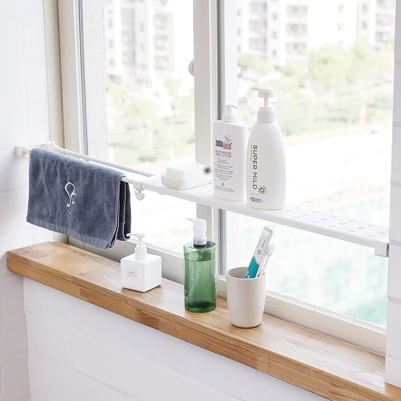 Double punching retractable adjustable storage shelf