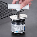 Can opener and jar twist