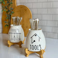 Porcelain spoon holder
