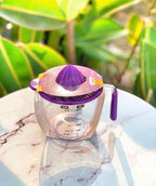 Juicer and measuring flask with acrylic handle