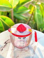Juicer and measuring flask with acrylic handle